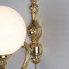 Ben Ornate Brass Wall Light with Opal Glass Globe